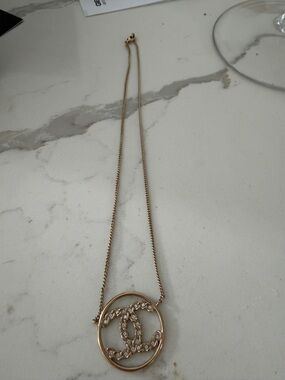 CHANEL Gold-Tone Interlocking CC Circle Pendant Necklace